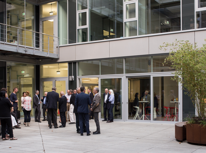 People at the entrance of the institute building